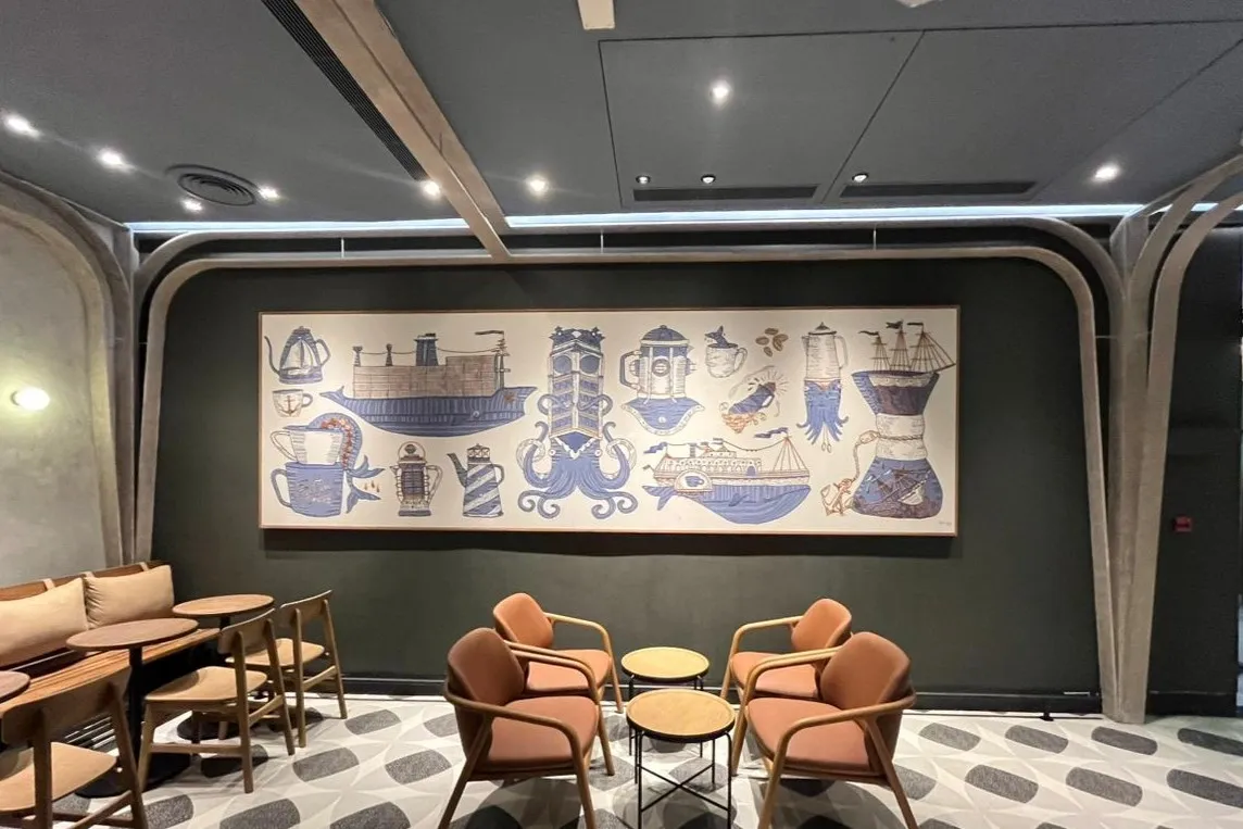 Screen-printed nautical and coffee mural at the Starbucks M2M jetty store
